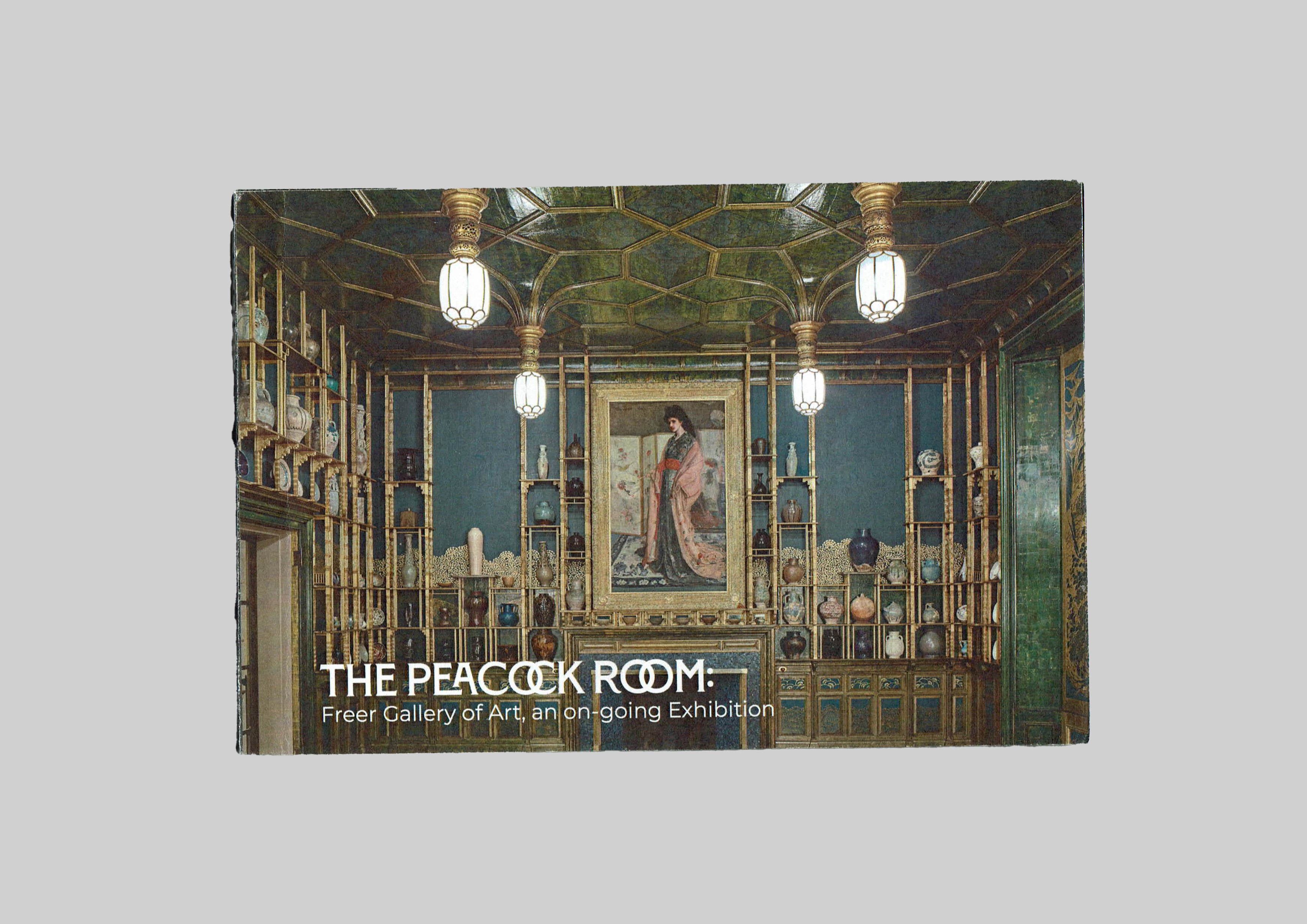 cover of the museum catalog which is an image of the southern wall of the peacock rom overlaid with white text